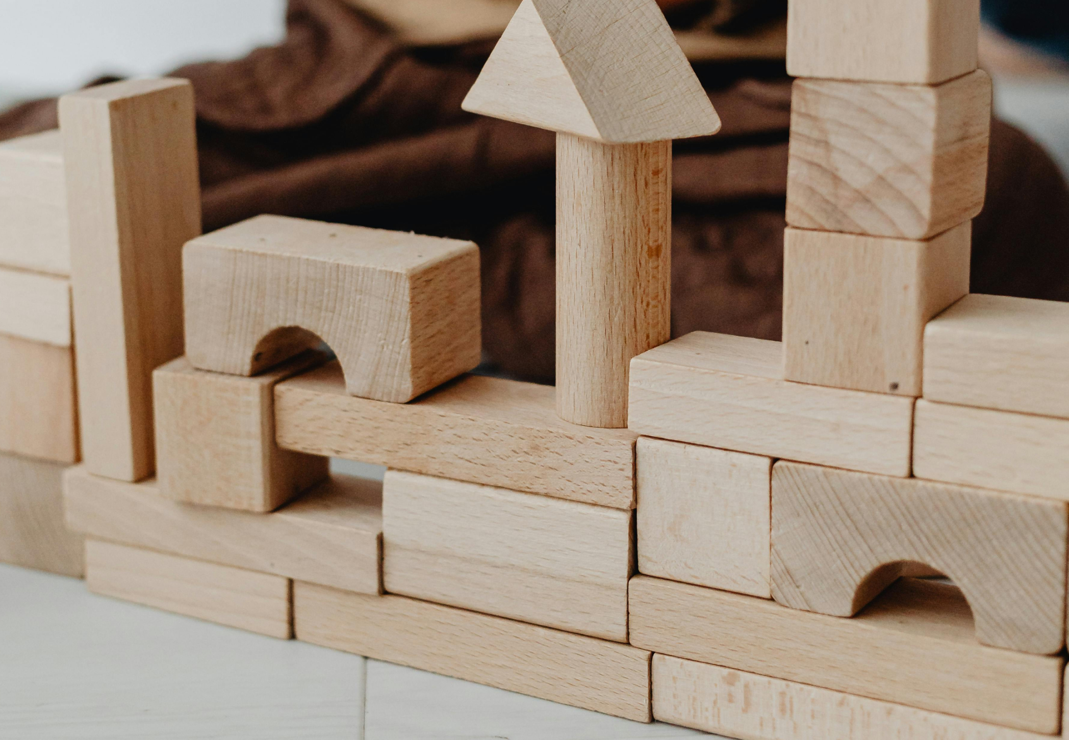 Stack of blocks representing the foundational pieces of brand strategy.